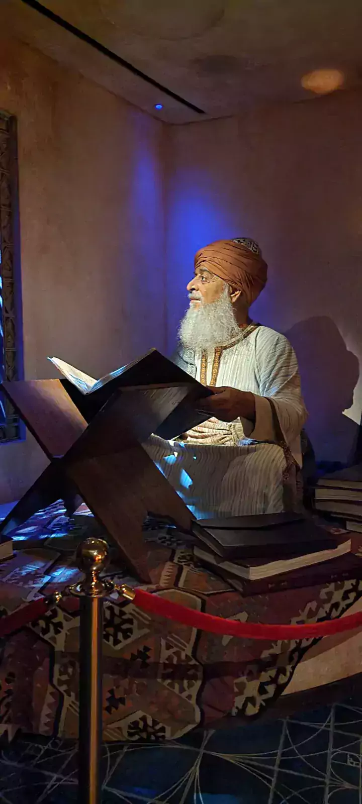 Historic figure praying the Quran