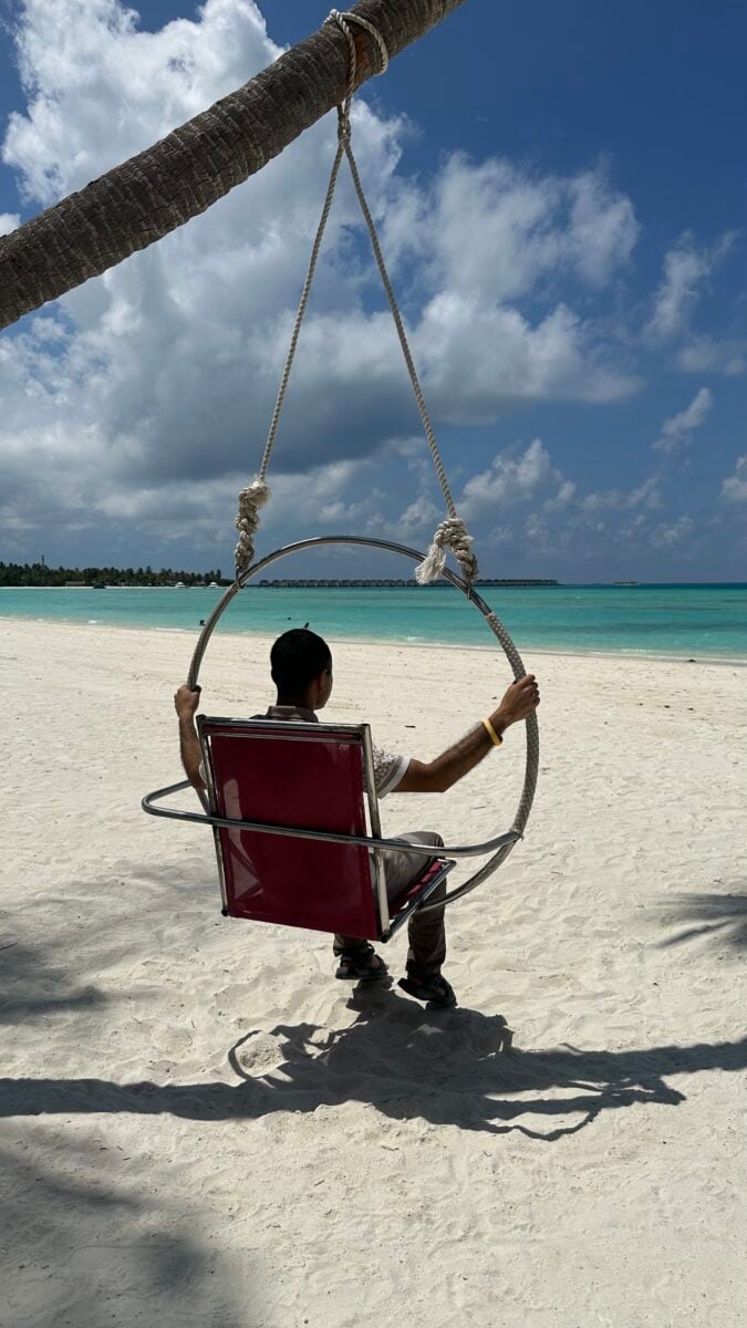 Adil Musa unwinding on the swings
