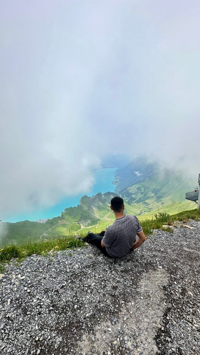 Adil Musa admiring the views of the lake and mountain