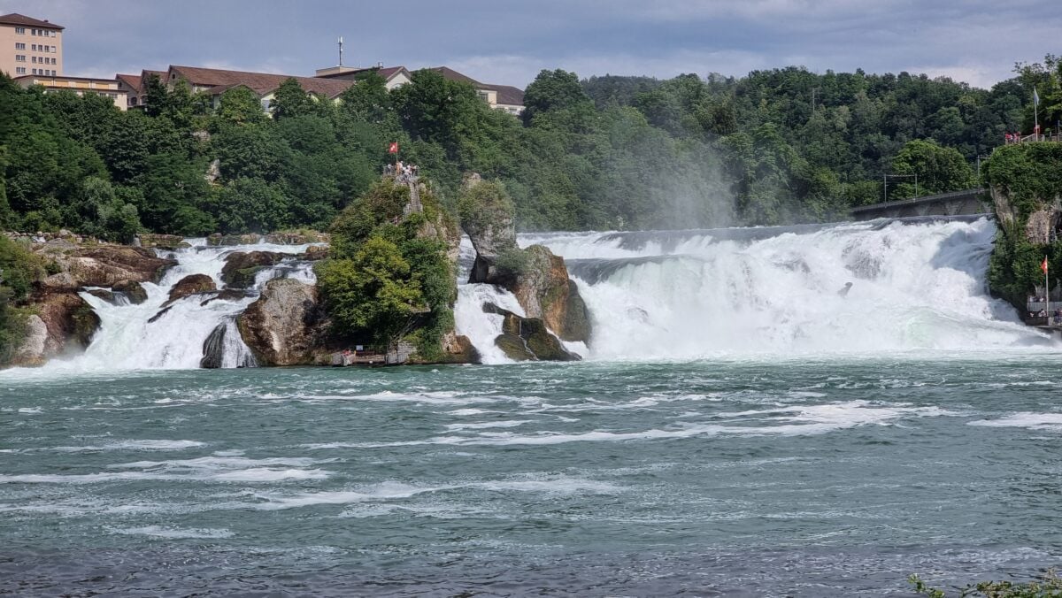 Majestic, thundering waters cascading over the rugged rocks at Rhine Falls
